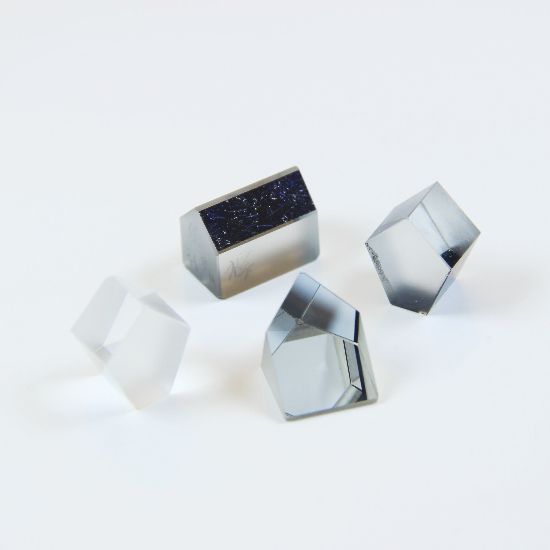 Coated and inked pentagonal prism products